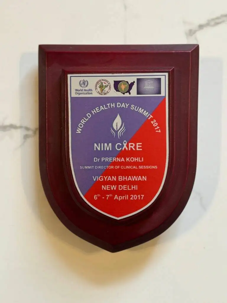 Dr. Prerna Kohli plaque as Summit Director of Clinical Sessions at NIM Care World Health Day Summit 2017 — Vigyan Bhawan New Delhi April 2017 — WHO UNESCO — Clinical Psychologist India
