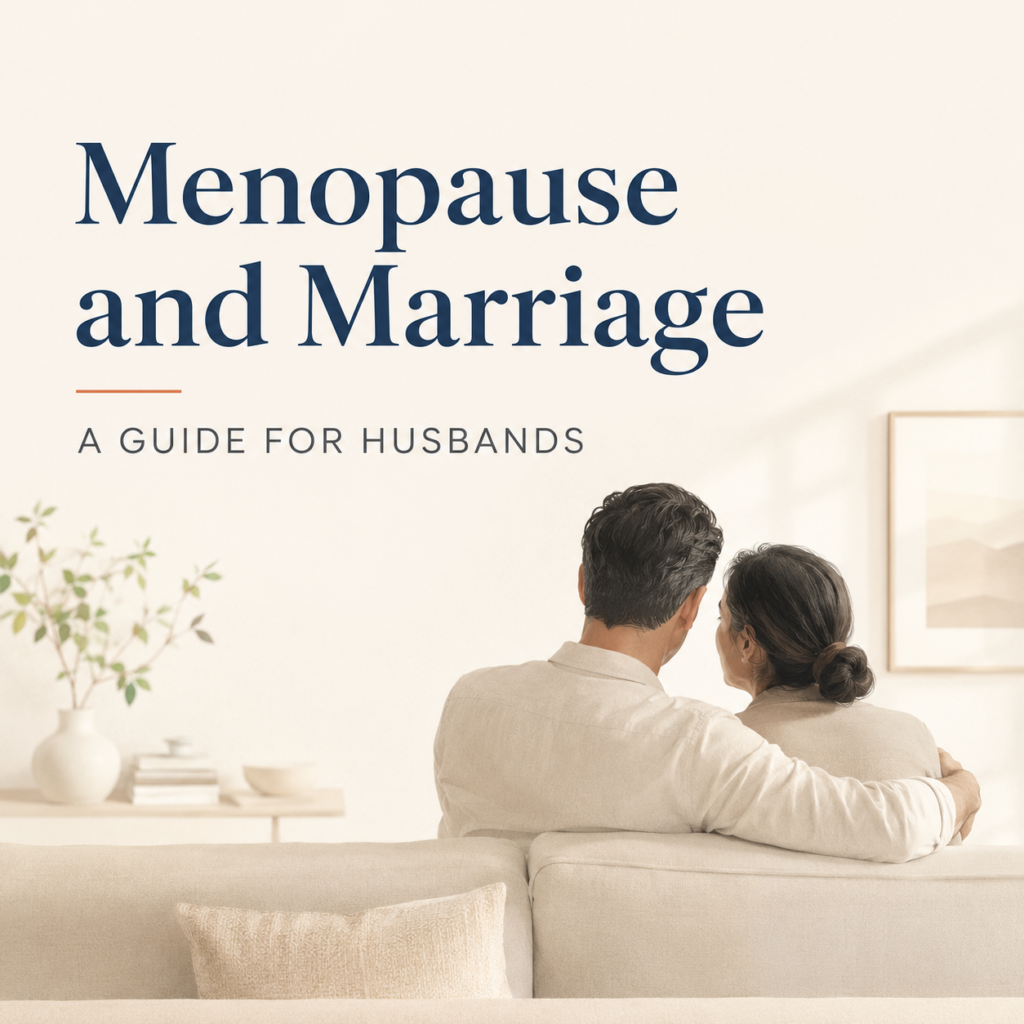 Supportive husband embracing his wife as they navigate menopause together in a calm, light-filled home, symbolising understanding, patience and emotional connection.